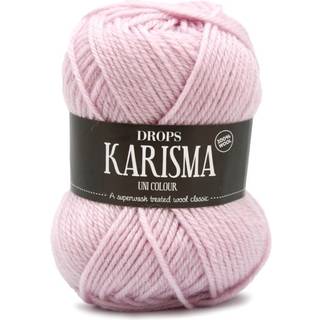 DROPS Karisma 66 Lys støvet rosa (Uni Colour) Indhold: 100% Uld Garngruppe: B (20 - 22 masker) / 8 ply / DK / worsted Vægt/længde: 50 gram = ca. 100 meter Anbefalede pinde: 4 mm Strikkefasthed: 10 x 10 cm = 21 m x 28 p Finvask med forsigtig centrifugering på 40ºC / Brug aldrig skyllemiddel / Tørres fladt.
