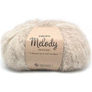 DROPS Melody 15 Beige (Uni Colour) Indhold: 71% Alpaca, 25% Uld, 4% Polyamid Garngruppe: D (12 - 15 masker) / 12 ply / chunky Vægt/længde: 50 g = ca. 140 meter Anbefalede pinde: 8 mm Strikkefasthed: 10 x 10 cm = 12 m x 14 p Håndvask, max 30°C / Tørres fladt / Kan filtes.