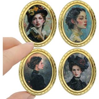 iLAND Miniature Dukkehustilbeh?r 4 Dukkehus billedrammer s?t med 4 sk?nhedsportr?tter (4 guldfarvede ovale rammer m/ 4 billeder)