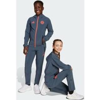 FC Bayern Tiro 25 Competition Vis Tech rejsebukser til børn - Bold Onix / Easy Coral - 128