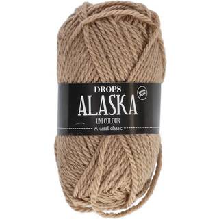 DROPS Alaska 68 Jordnød (Uni Colour) Indhold: 100% Uld Garngruppe: C (16 - 19 masker) / 10 ply / aran / worsted Vægt/længde: 50 gram = ca. 70 meter Anbefalede pinde: 5 mm Strikkefasthed: 10 x 10 cm = 17 m x 22 p Håndvask, max 30°C / Tørres fladt / Kan filtes.