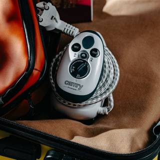 Adler dampstrygejern til rejsebrug