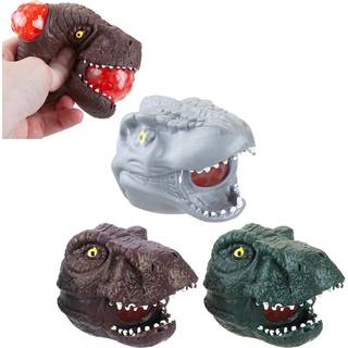 Matschiger Dinosaurierkopf mit Dino-Eiern