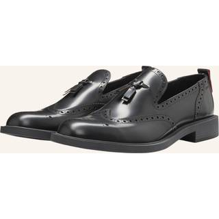 Loafers i læder med broguedetaljer
