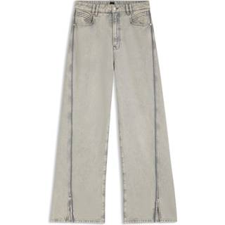 Jeans i grå denim med med vide ben og slidser i kanten