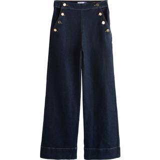 Next Jeans med guldknapper foran og brede ben