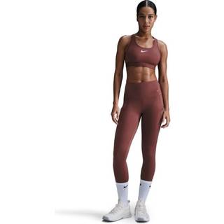 Nike Therma-FIT 7/8 Tights til kvinder i rød - Komfort og varme til løb året rundt