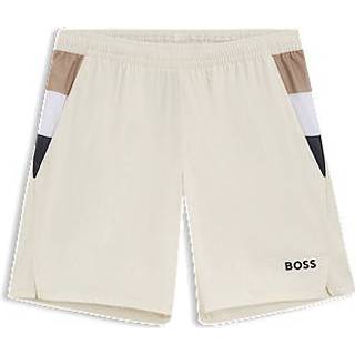 Tennisshorts til træning i stof med stræk og fugtkontrol