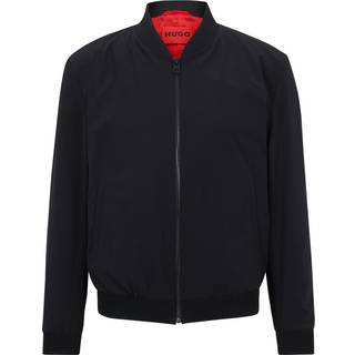 Sammenpakkelig jakke i slank pasform med rødt for