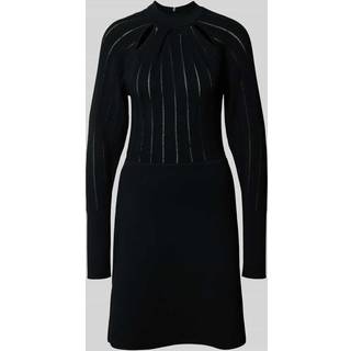 Strikket kjole med skaterdesign og hulmønster