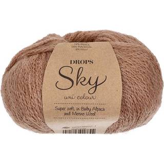 DROPS Sky 22 Mandel (Uni Colour) Indhold: 74% Alpaca, 18% Polyamid, 8% Uld Garngruppe: B (20 - 22 masker) / 8 ply / DK Vægt/længde: 50 g = ca. 190 meter Anbefalede pinde: 4 mm Strikkefasthed: 10 x 10 cm = 21 m x 28 p Håndvask, max 30°C / Tørres fladt.