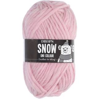 DROPS Snow Uni Colour 30 Pastelrosa (Uni Colour) Indhold: 100% Uld Garngruppe: E (9 - 11 masker)/ 14 ply / super bulky Vægt/længde: 50 gram = ca. 50 meter Anbefalede pinde: 9 mm Strikkefasthed: 10 x 10 cm = 10 m x 14 p Vask: Håndvask, max 30°C / Tørres fladt / Kan filtes.