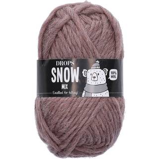 DROPS Snow Mix/Print 48 Nougat Indhold: 100% Uld Garngruppe: E (9 - 11 masker)/ 14 ply / super bulky Vægt/længde: 50 gram = ca. 50 meter Anbefalede pinde: 9 mm Strikkefasthed: 10 x 10 cm = 10 m x 14 p Vask: Håndvask, max 30°C / Tørres fladt / Kan filtes.