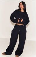PrettyLittleThing Embroidered Interlock Rib Panel Wide Leg Joggers - Black