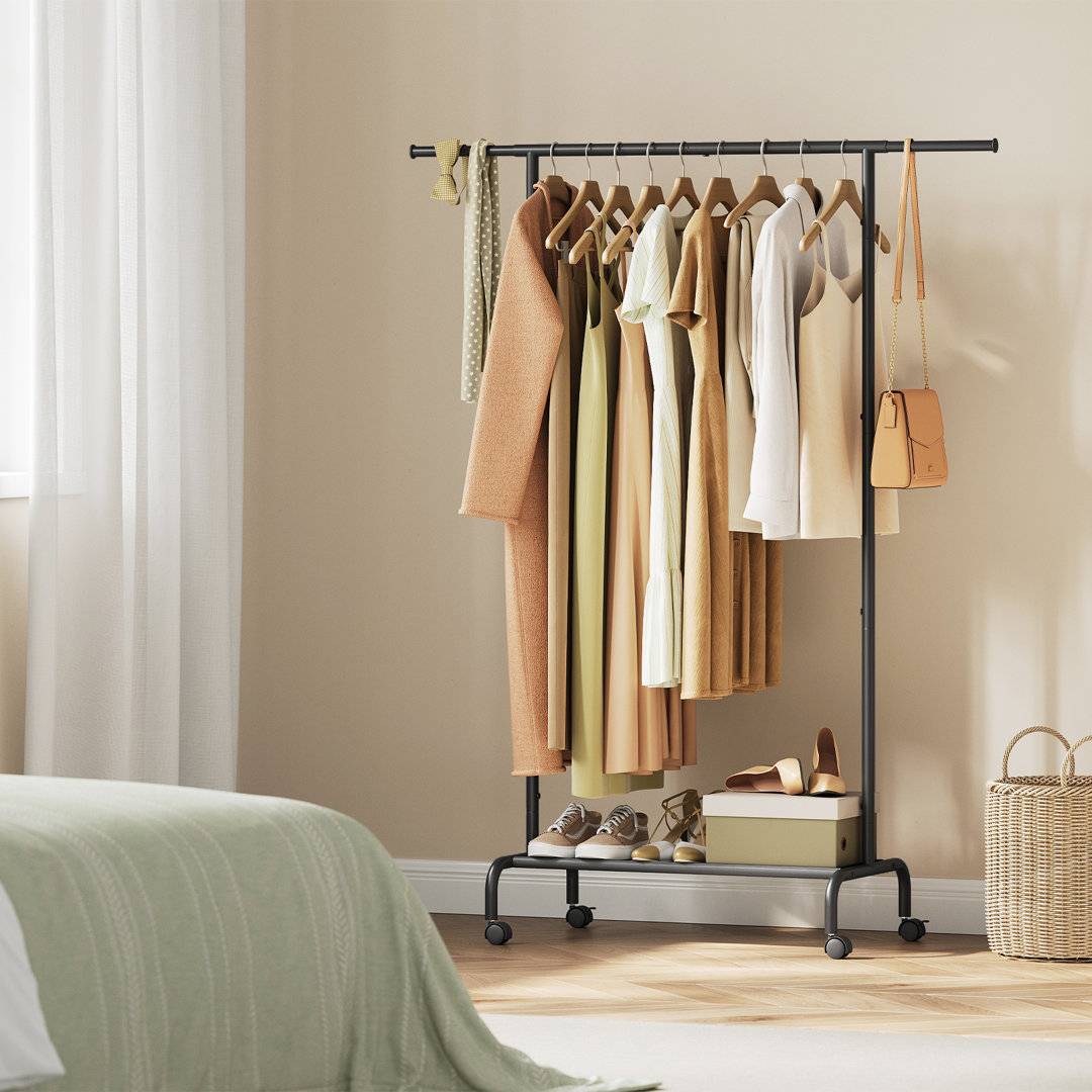 Clothing rack Rebrilliant 124cm Adjustable Clothing Rack Black Clothes Rack