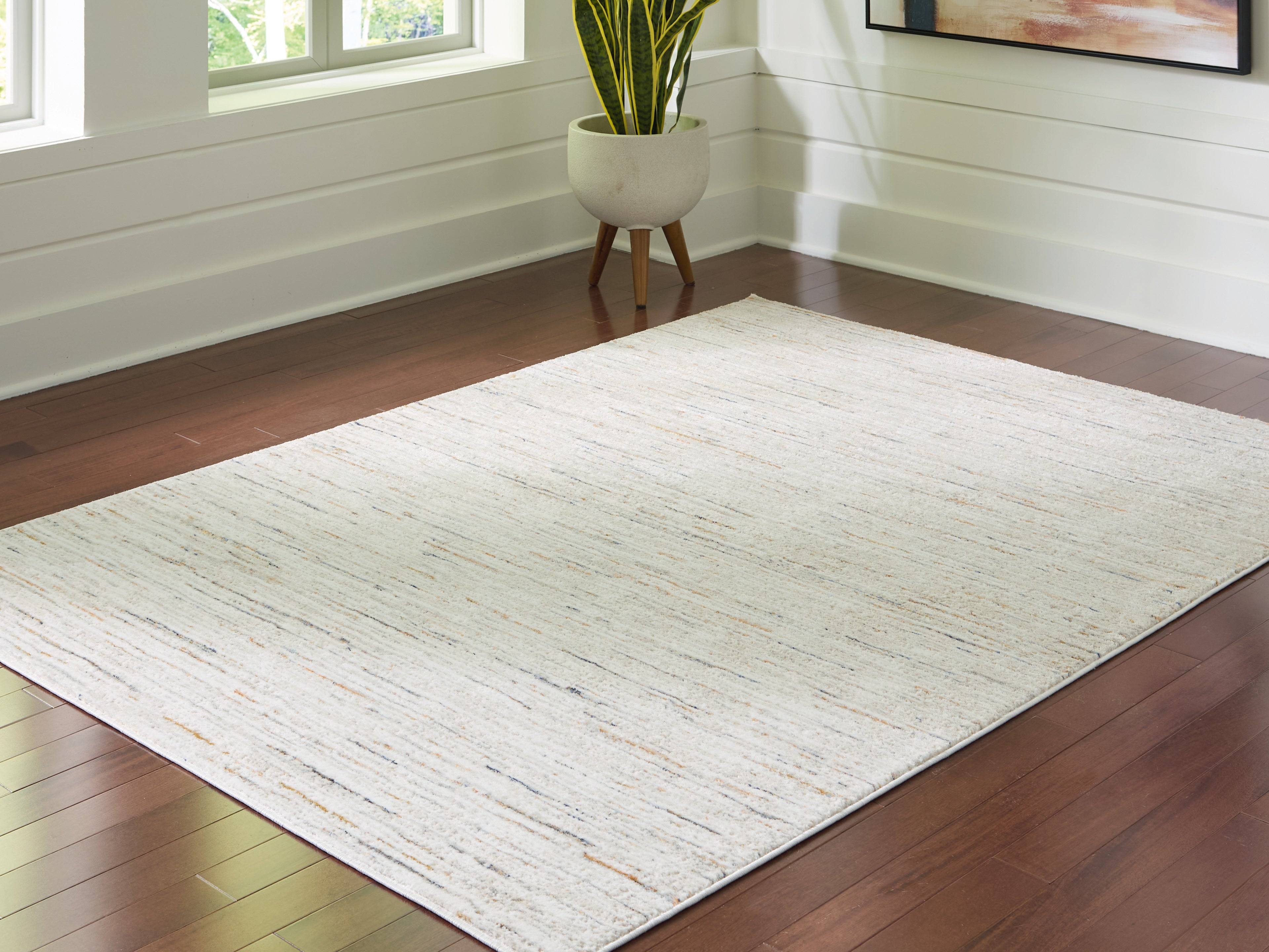 Signature Design by Ashley Harjot Medium Rug In Multi Multicolor 60x"
