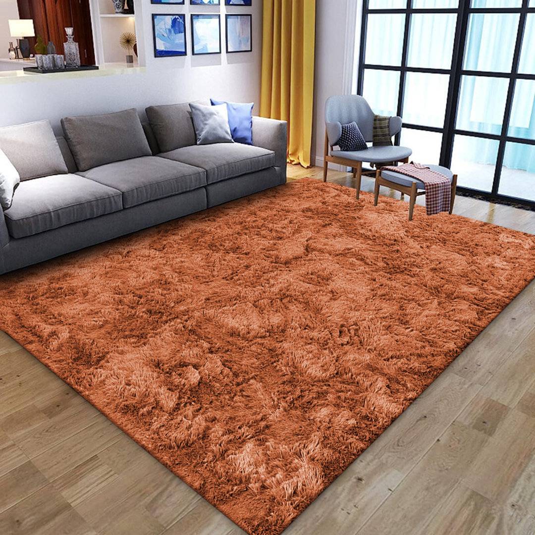 Ebern Designs Polypropylene Rust Non Slip Backing Area Rug 120 x 170 Brown cm