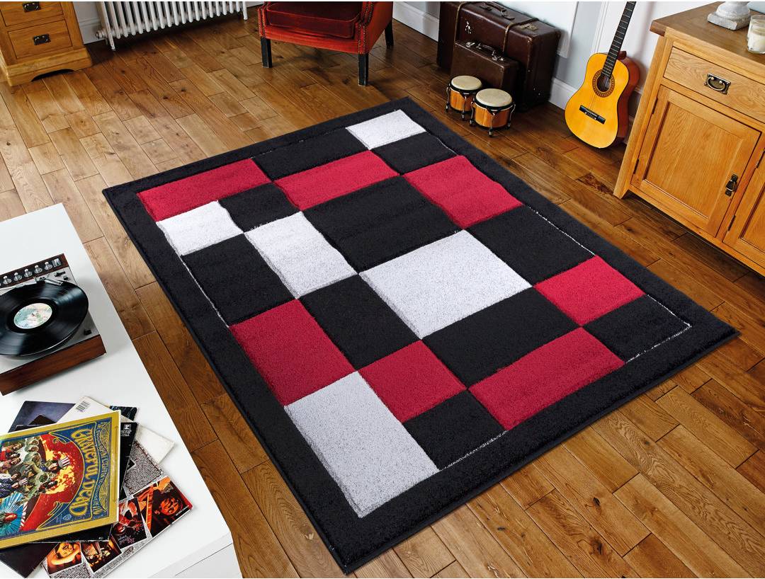 Ebern Designs Durmuå Geometric Area Rug Red