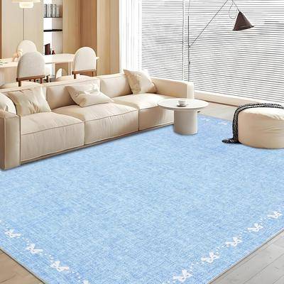 Garvee Bow Pattern Bordered Area Rug