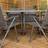 Samuel Alexander Outdoor 6 Glass Top Table Chairs with Parasol in Grey Patio Dining Set