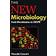 The New Microbiology: From Microbiomes to CRISPR