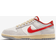 NIKE Dunk Low M - Sail/Photon Dust/Light Smoke Grey/Picante Red