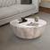 The Urban Port Mango Wood Distressed White Coffee Table 36"