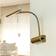 Trio Lighting Curtis Brass Aplique de pared