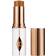 Charlotte Tilbury Unreal Skin Sheer Glow Tint - Återfuktande Foundationstift 13 Deep