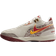 Nike LeBron NXXT Gen AMPD - Light Bone/University Gold/Team Crimson