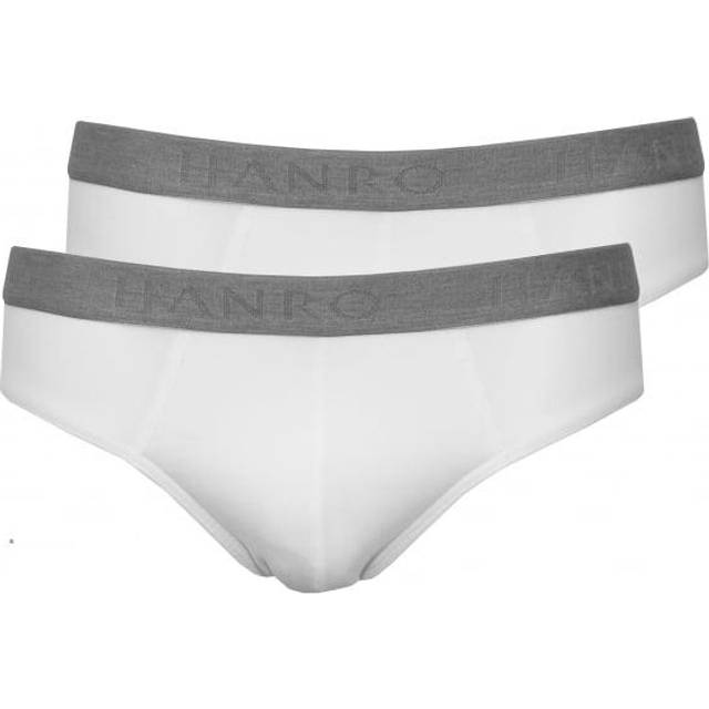 Two-Pack Cotton Essentials Briefs White - 0101 - Stylishly cut, these everyday basic briefs by Swiss brand Hanro are spun from cotton jersey with added stretch for comfort. Both pairs are cut for a regular rise and feature a contrasting elastic waistband with the brand logo printed across. The breathable cotton feels great on the skin.