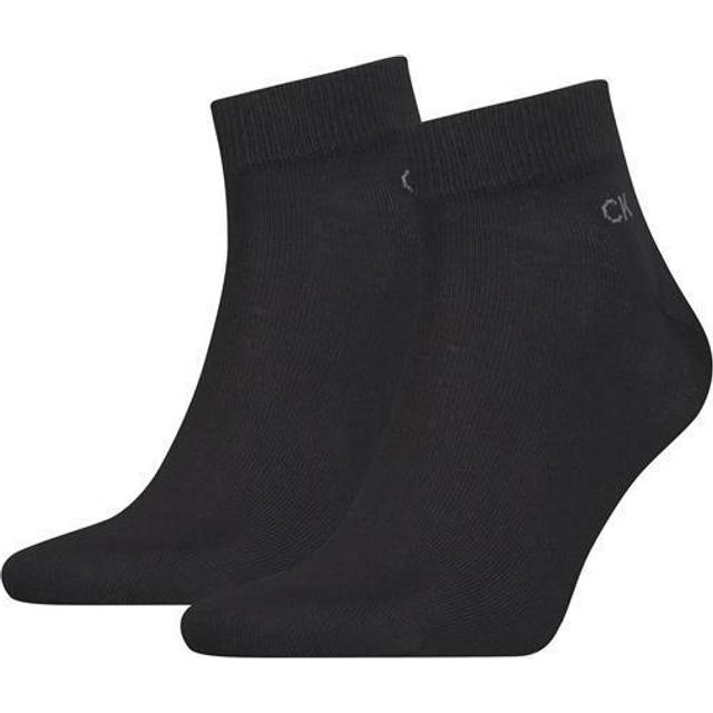 Two-Pack Quarter Length Socks - 001 - Calvin Klein has gained quite the reputation for its clean-cut designs and its collection of socks are no exception. The label combines minimalism with its iconic branding to create comfortable staples you can start your day in.