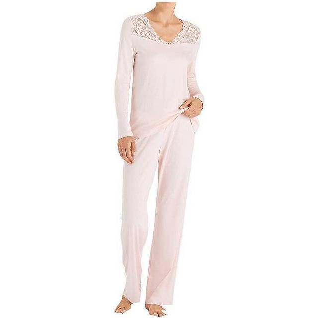 Moments Long Sleeve Pyjamas - 0101 White - Staying home more often has its perks – you won't have to wait all day to slip into Hanro’s Moments pyjamas. Made from mercerised cotton, the top features a floral embroidered V-neck, while the matching bottoms have an elasticated waistband for comfort.