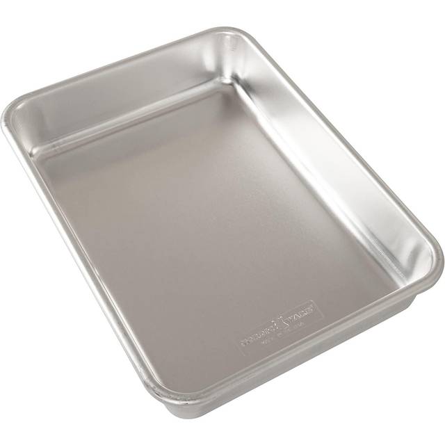 Nordic Ware Natural Aluminum Commercial Rectangular Cake Pan  Exterior dimensions 12.9 x 9.5 x 2.5 inches and interior dimensions 12.1 x 8.8 x 2.5 inc