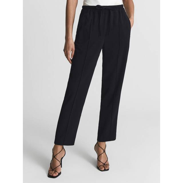 Hailey Pull On Trousers - BLACK - A relaxed take on tailoring, the Hailey trousers from Reiss work a modern feel and can easily be dressed-up or down. Cut with a drawstring waist and a tapered leg, they can be styled with a blouse and heels for work or with a tee and trainers at the weekend.