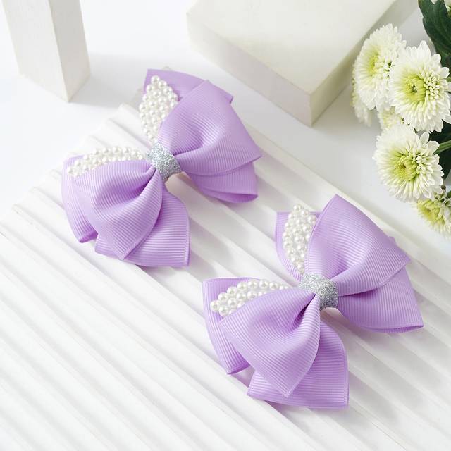 SHEIN 2pcs Toddler Girls Faux Pearl & Bow Decor Hair Clip