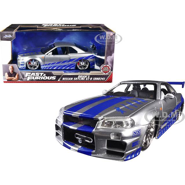 Brians Nissan GTR Skyline R34 RHD (Right Hand Drive) Silver with Blue Stripes "Fast & Furious" Movie 1/24 Diecast Model Car by Jada