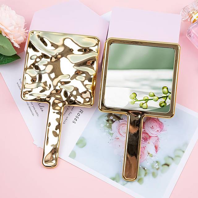 SHEIN 1pc Portable Handle Mirror Electroplated Makeup Mirror With Asymmetric Creative Design For Beauty Room, Dormitory