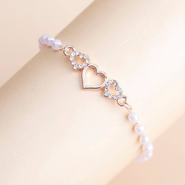 1 st Fashionabla avancerade eleganta minimalistiska delikata mångsidiga hjärtformade strass- och fuskpärlormband, lämpligt för kvinnor dagligt slitage - Rosa Guld (En-Storlek)
