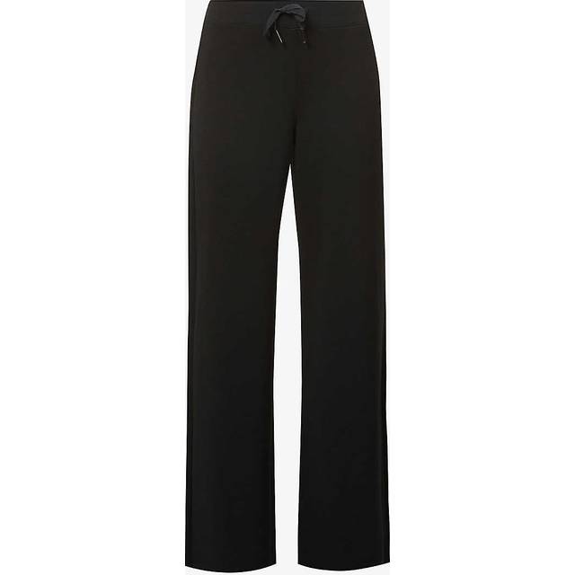 AirEssentials Wide Leg Sweat Bottoms - Very Black - Spanx launched in 2000 and after years of success selling shapewear and underwear the brand delved into women’s apparel, which was met with the same level of popularity. From shaping leggings to smoothing t-shirts, the label is the one stop shop for comfortable wardrobe essentials that accentuate the feminine figure.
