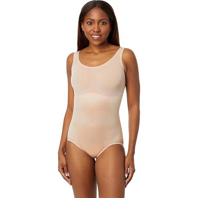 Thinstincts 2.0 Medium Control Tank Brief Bodysuit - Champagne Beige - Since launching in 2000 Spanx have redesigned the world of shapewear and underwear, proving to women that comfort shouldn’t be a bonus but a guarantee when wearing daily necessities. The brand has a huge array of products for every figure and skin tone.