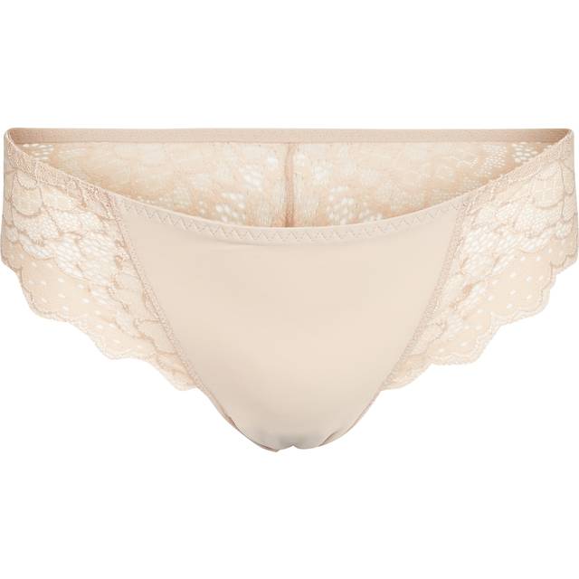 Caresse Lace Trim Tanga - Peau Rose - Your underwear collection deserves the decadence of French lingerie, and the Caresse Tanga from Simone P&eacute;r&egrave;le is a chic starting point. Decorated with scalloped lace panels, it includes a lined gusset and elasticated waist for additional comfort.