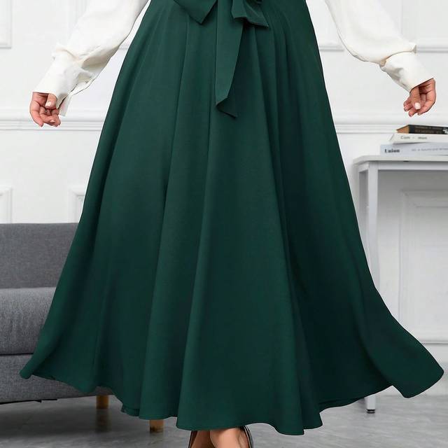 SHEIN Women&#39;s Plus Size Solid Color High Waist Front Knot Design Long Skirt