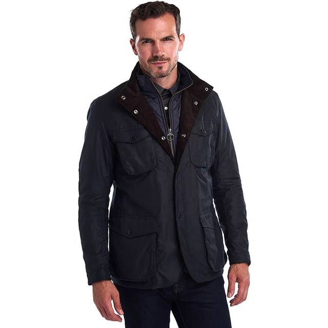 Ogston Wax Jacket - NY71 - A longstanding brand in the world of British fashion, Barbour continues to champion understated elegance across its ready-to-wear collections and renowned outerwear. Inspired by the outdoors and country life, each given design balances visual aesthetic with welcome practicality.