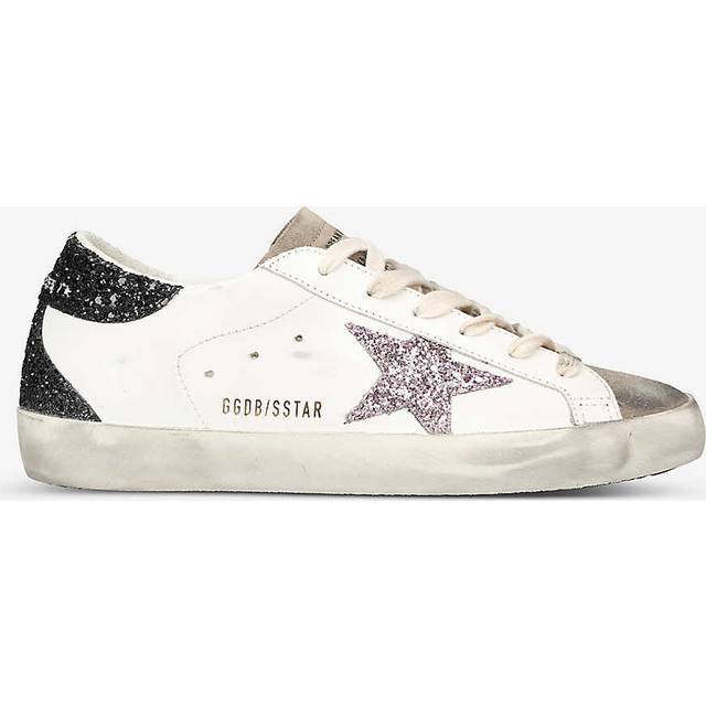 Superstar Lace-Up Trainers - WHITE - Lend an edgy touch to your weekend edit with the Superstar Trainers from Golden Goose. Created in the brand's signature lived-in design, they're complete with foil lettering and the brand's signature star for a stellar finish.