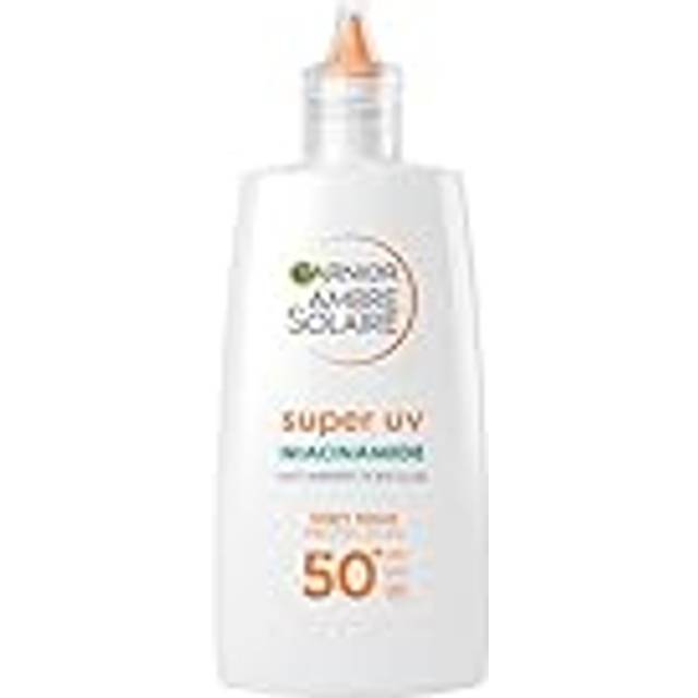 Garnier Ambre Solaire Super UV Niacinamide Lättviktsskyddsvätska för att behandla hudbristningar SPF 50+ 40 ml
