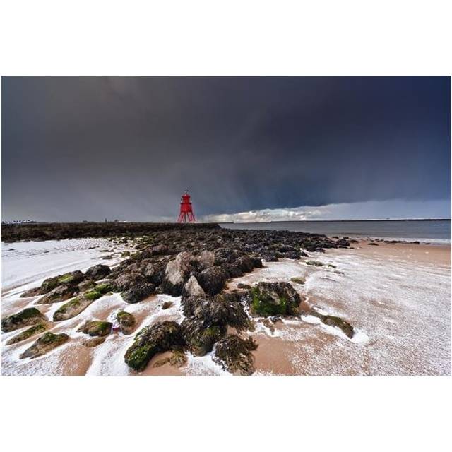 A Red Lighthouse Along The Coast Under A Stormy Sky - South Shields, Tyne & Wear, England Poster Print, 19 x 12