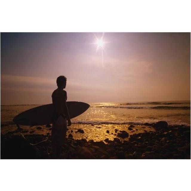 Surfer At The End of The Day On The Beach Poster Print by Darren Greenwood, 17 x 11
