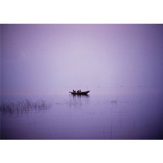 View of A Boat In A Placid Lake Poster Print, 32 x 22 - Large