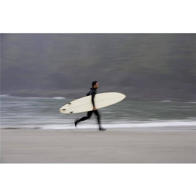 A Surfer Running with Board Along The Shoreline Poster Print by Deddeda, 34 x 22 - Large